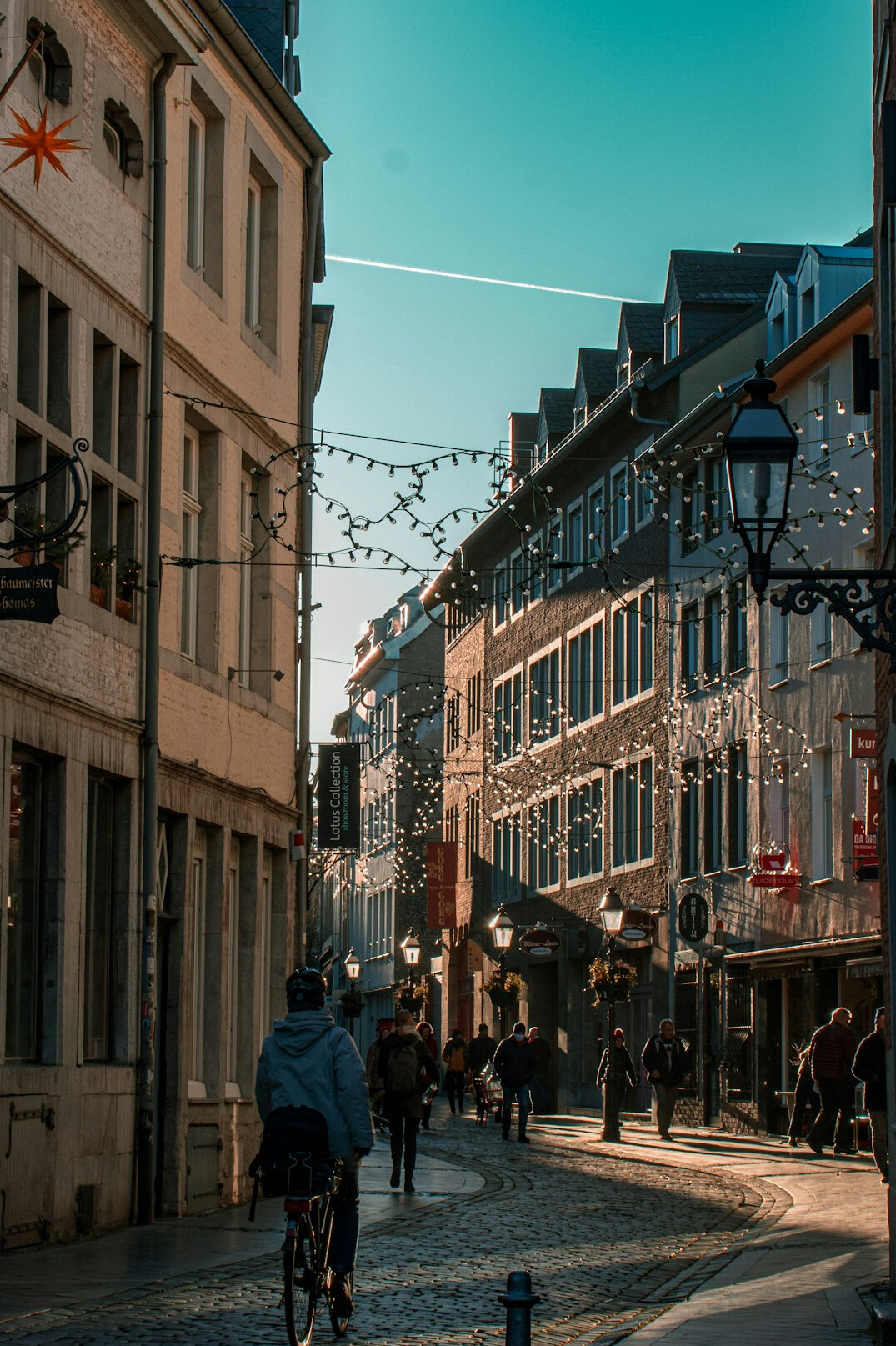 person walking on city street