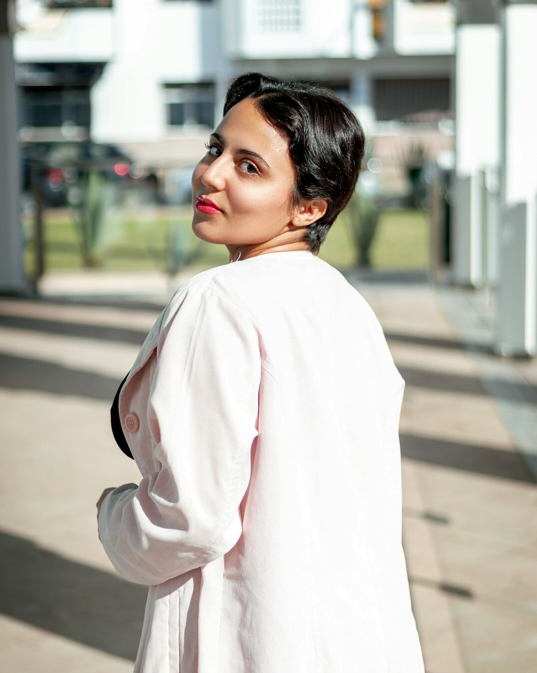Portrait of a smiling Latin American woman photographer